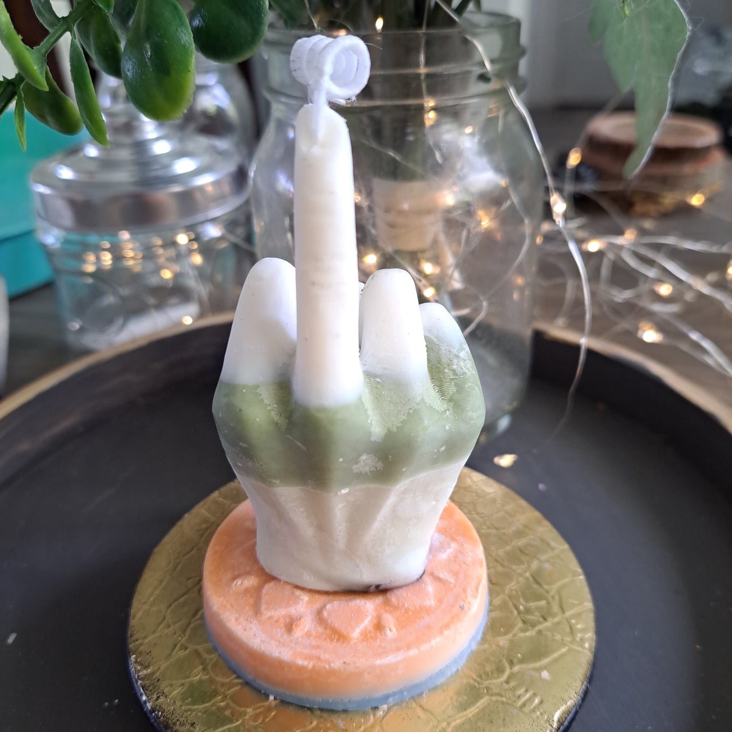 Green and white middle finger soy candle