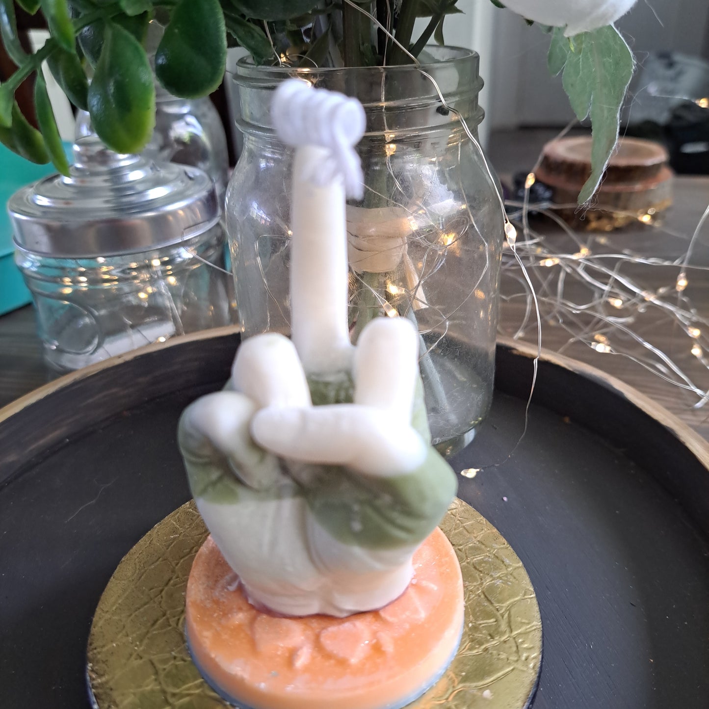 Green and white middle finger soy candle