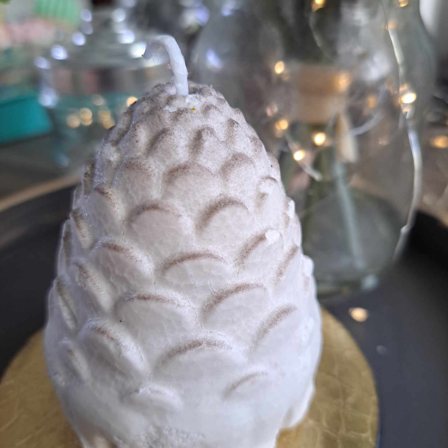 Pine cone candle