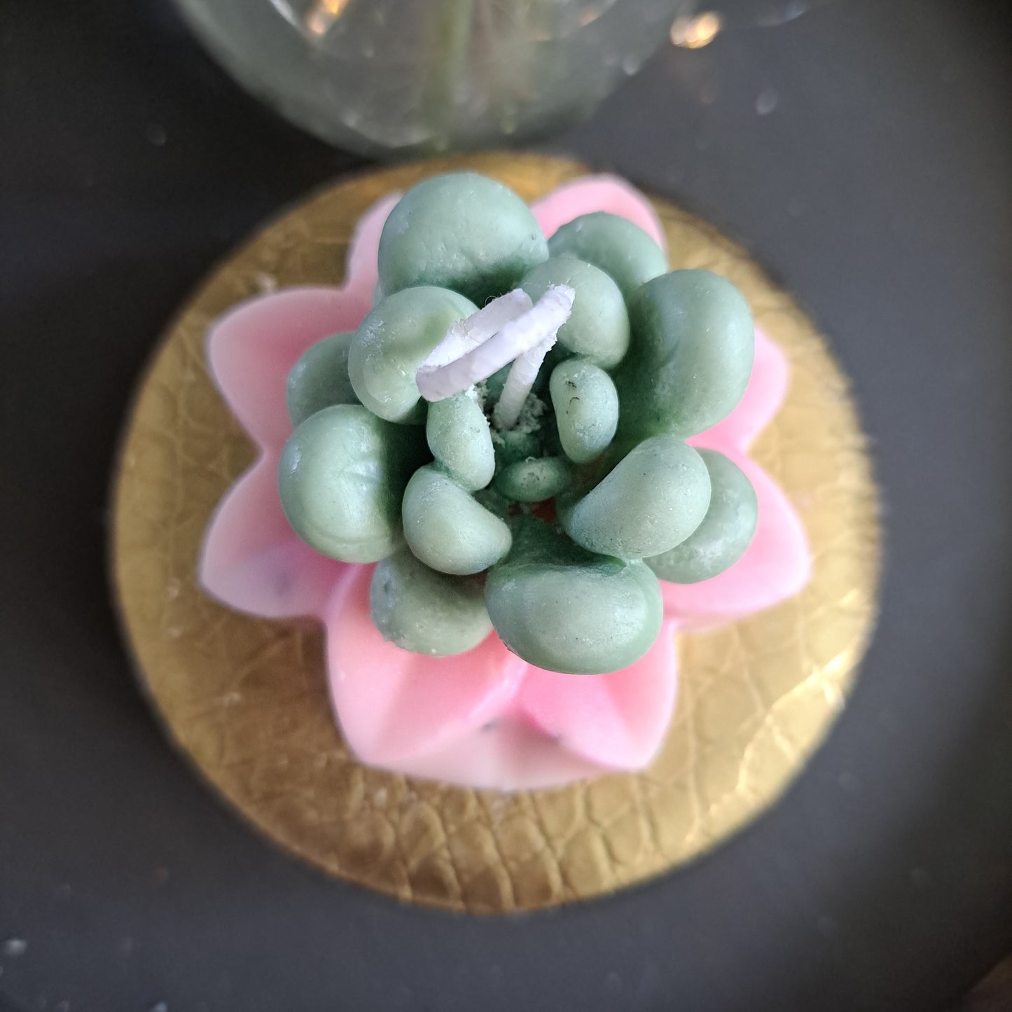 Pink and green flowing cactus candle