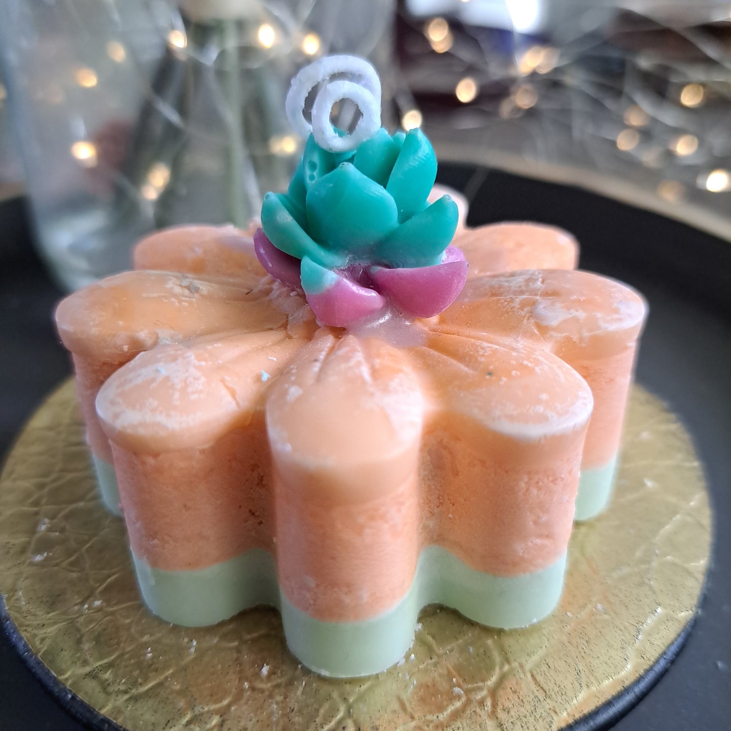 Orange, purple and green flowing cactus candle