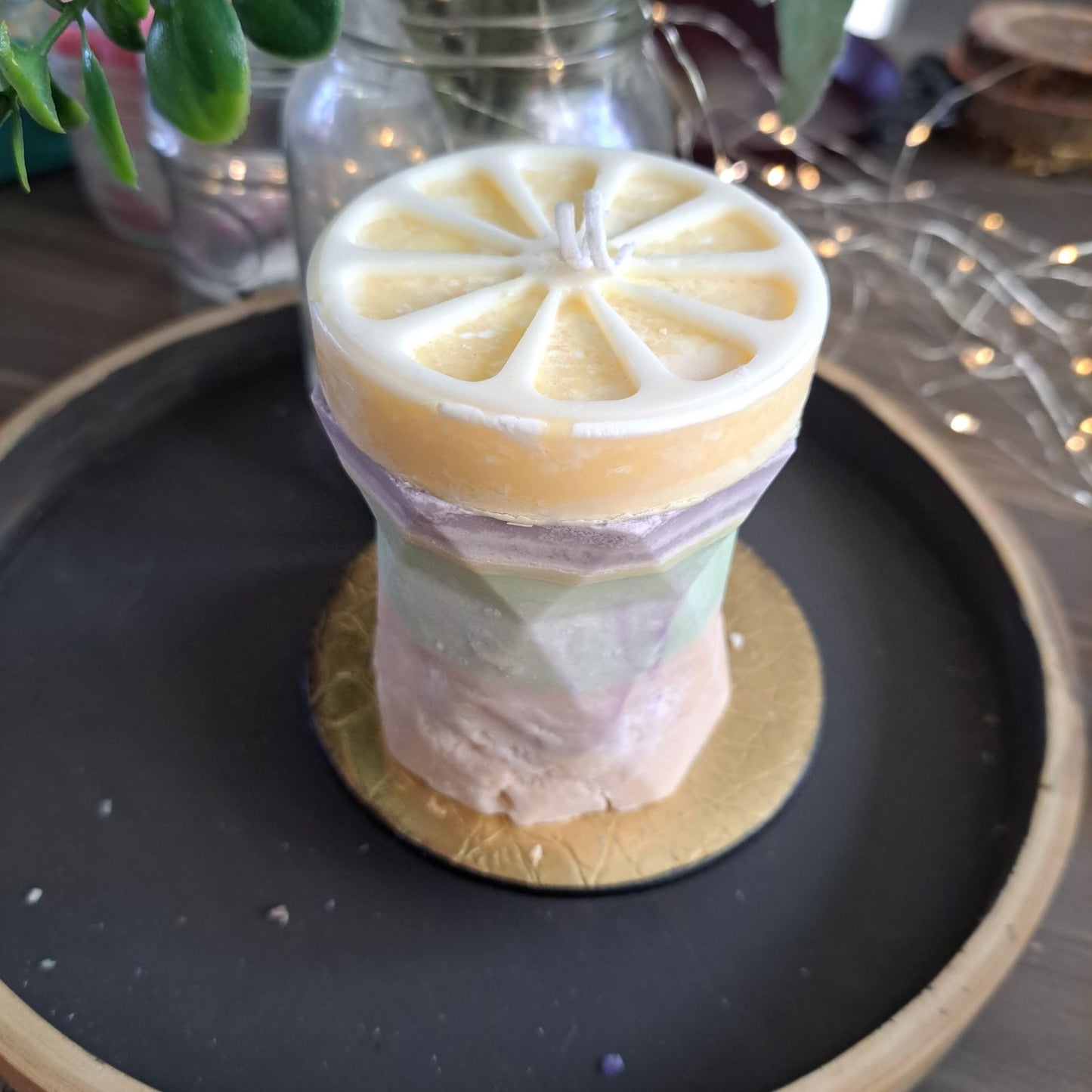 Multi colored lemon soy candle