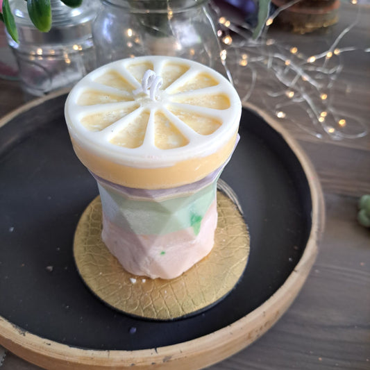 Multi colored lemon soy candle